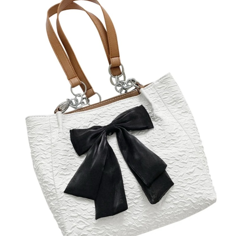 Elegant White Bag with Black Bow